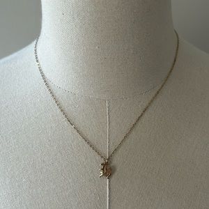 Gold “H” necklace